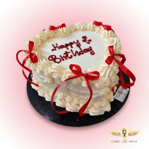 Heart-Shaped Birthday Cake with Ribbons